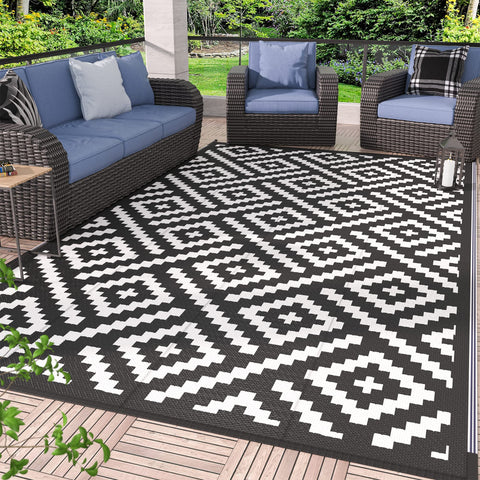 Genimo outdoor rug 6x9 waterproof surface ideal for patio protection and easy cleanup.