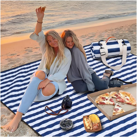 Genovega extra-large picnic blanket folds for easy travel.