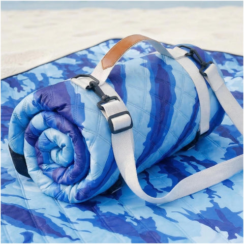 Genovega waterproof sandproof beach blanket laid on sand showing dry surface and wide coverage