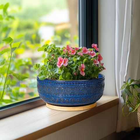 G EPGardening outdoor patio setup featuring round ceramic planter