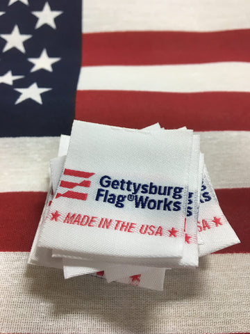 Gettysburg Flag Works canvas header with brass grommets enables easy flagpole mounting.