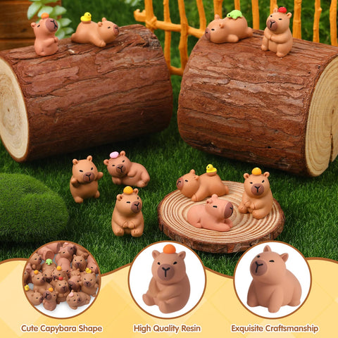 GGSTDDUP capybaras on desk or terrarium: playful decor and storytelling potential.