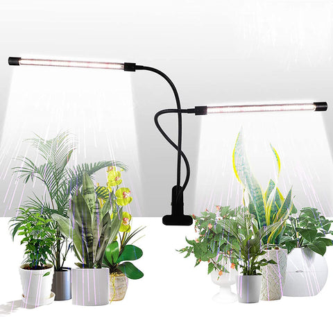 GHodec grow light with two bars provides full spectrum illumination for indoor leafy plants.