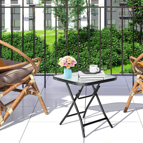Giantex outdoor patio setup beside chairs and plants