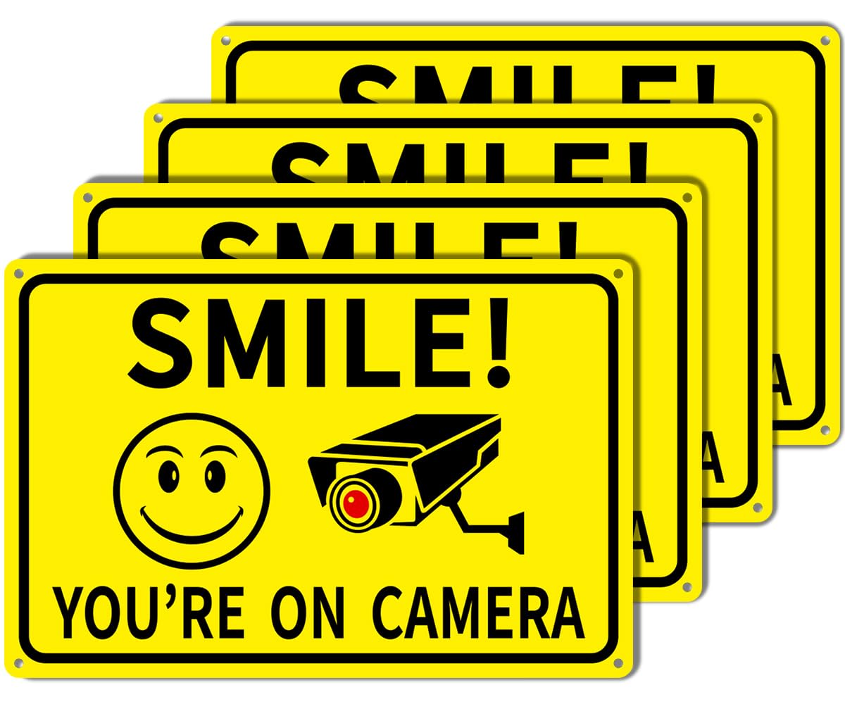 Giftape Smile On Camera sign 8x12 aluminum for clear outdoor visibility.