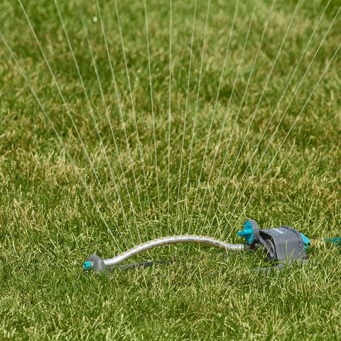 Gilmour hose-attachment view highlighting quick-connect and compatibility with other sprinklers.