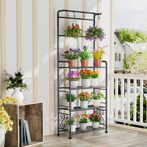 GIOTORENT 68-4 tall plant stand positioned in a living room for vertical greenery.