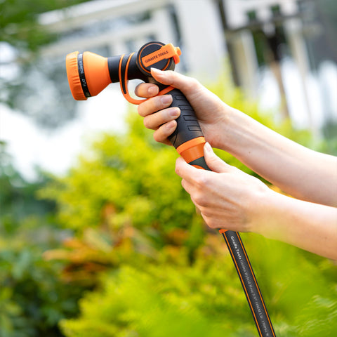 Giraffe Tools hose easy coil and uncoil for quick sprinkler setups.