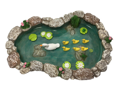 GlitZGlam Duck Pond features a playful frog accent for whimsy in outdoor miniatures.