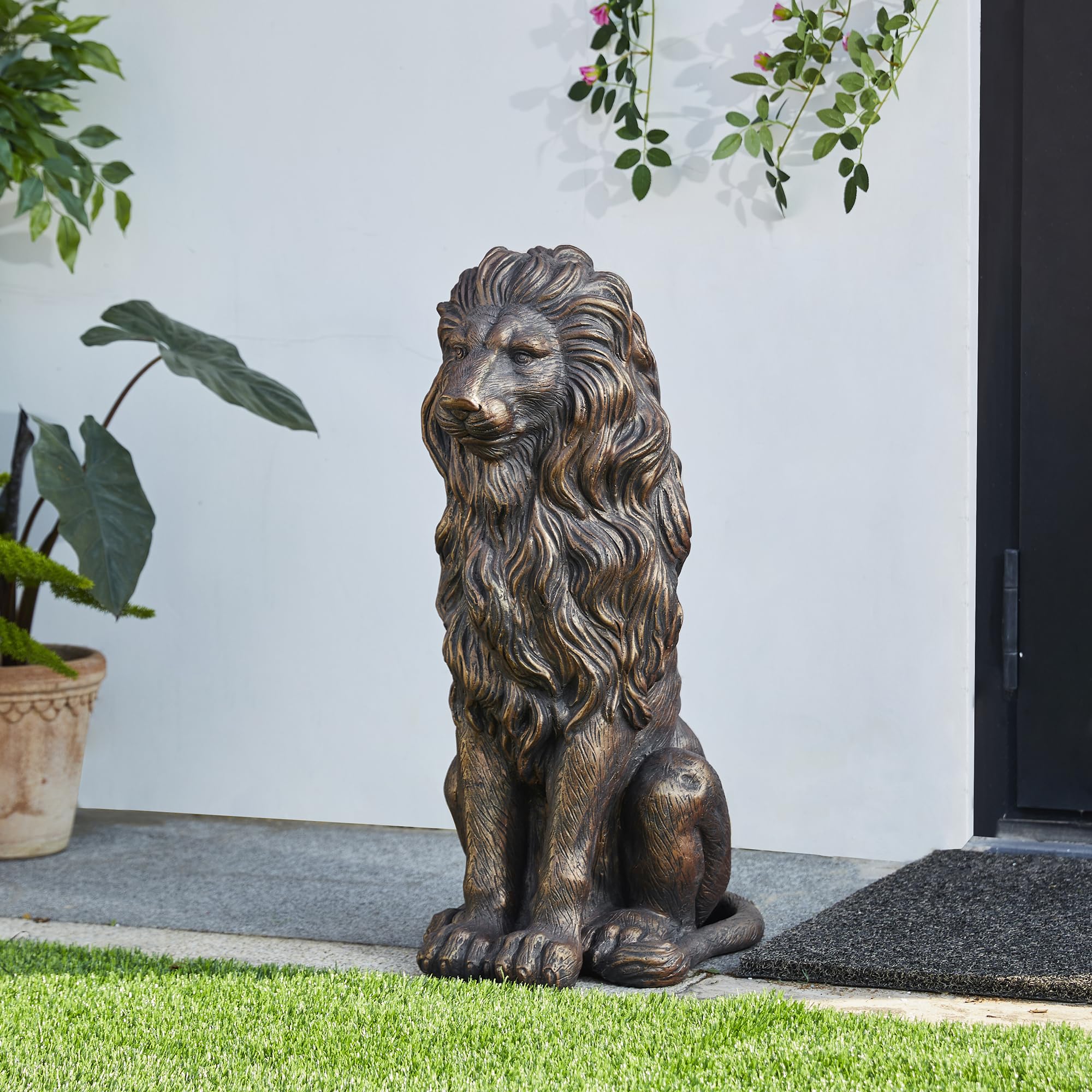 Glitzhome easy-to-move lion statue, lightweight despite regal look.