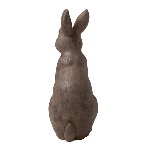 Glitzhome statue in garden setting brings character without heavy lifting.