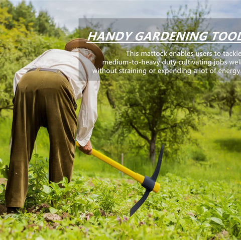 glorousamc mattock in soil illustrating tough ground penetration and loosening ability.