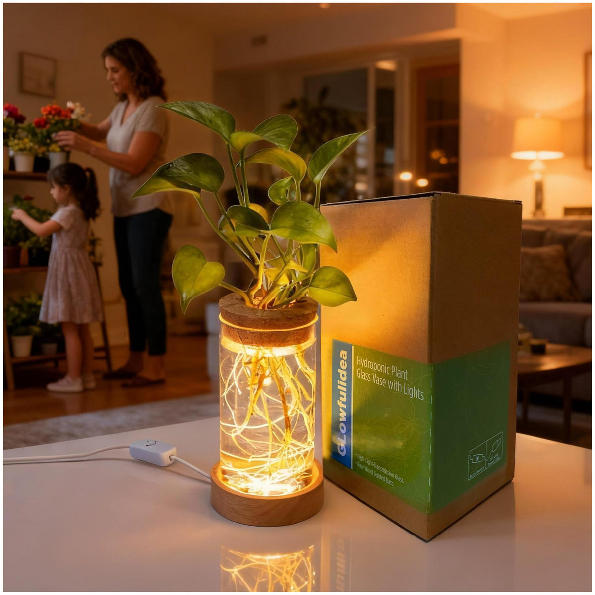 Glowfulidea plant propagation station with light on a desk, aiding growth