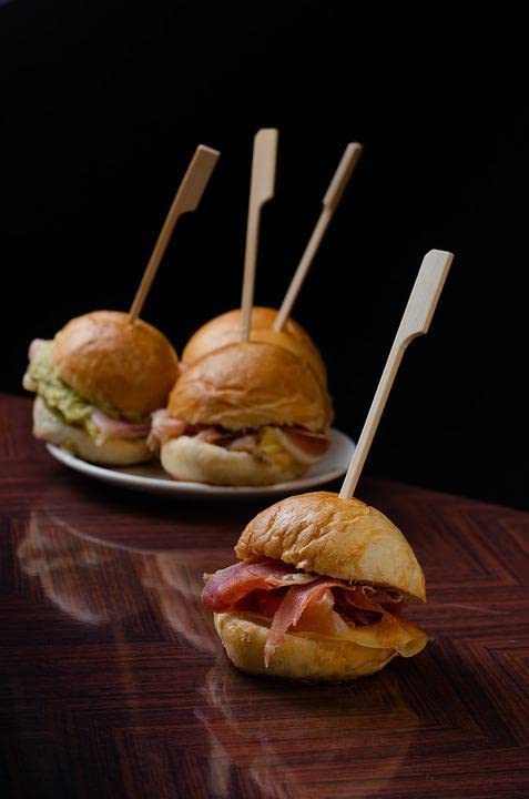 Gmark bamboo paddle skewers elevating appetizers and canapes on a platter.
