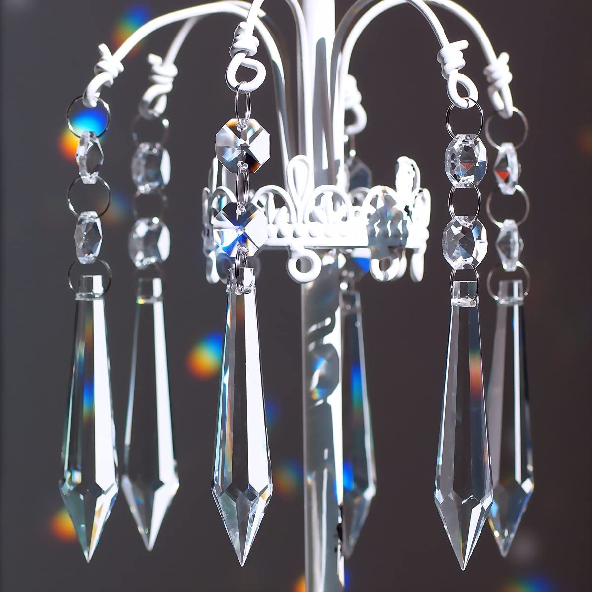 GOLDENHAITAI crystal sun catcher displays rainbow hues in sun