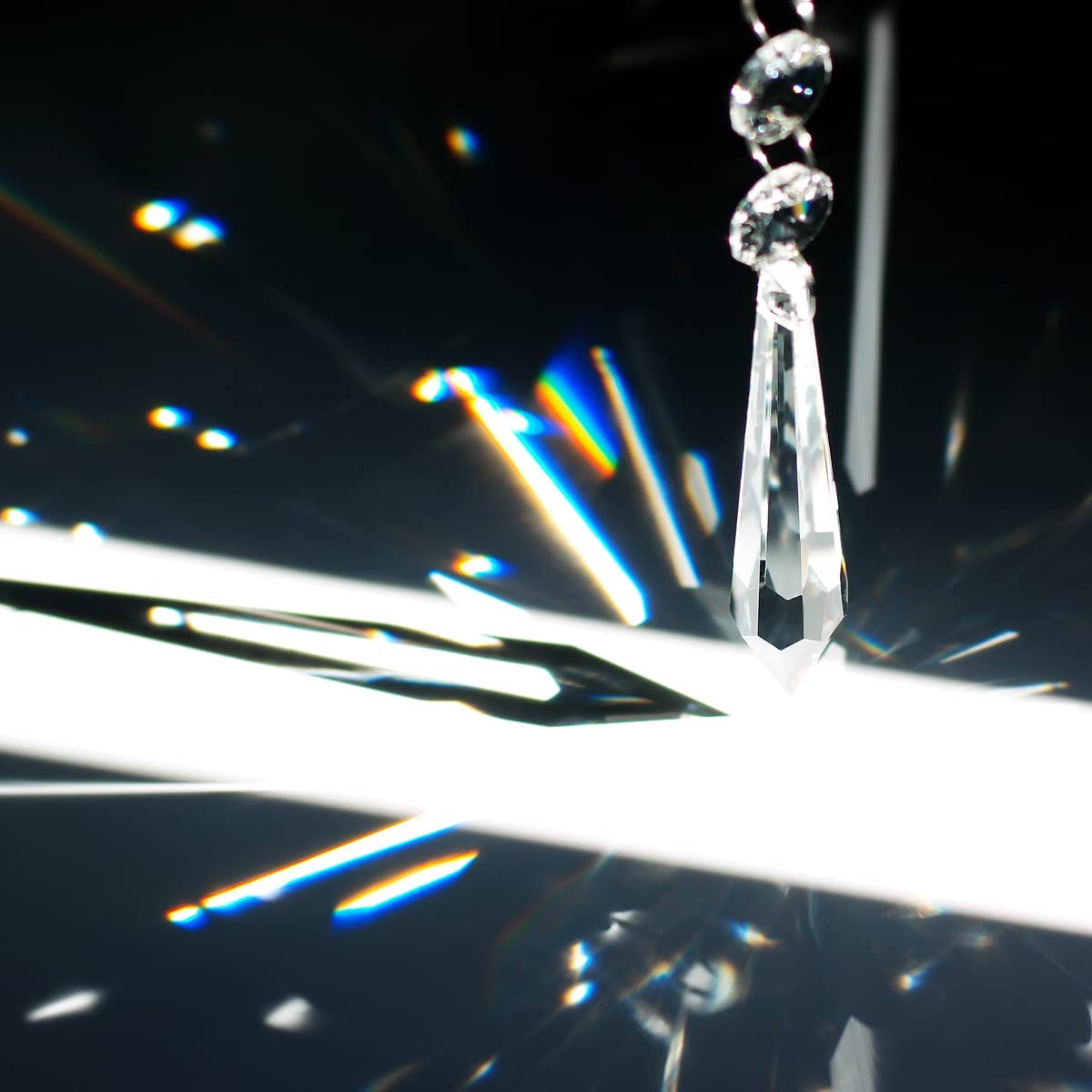 GOLDENHAITAI icicle prism 76mm pendant creates rainbow reflections on windows