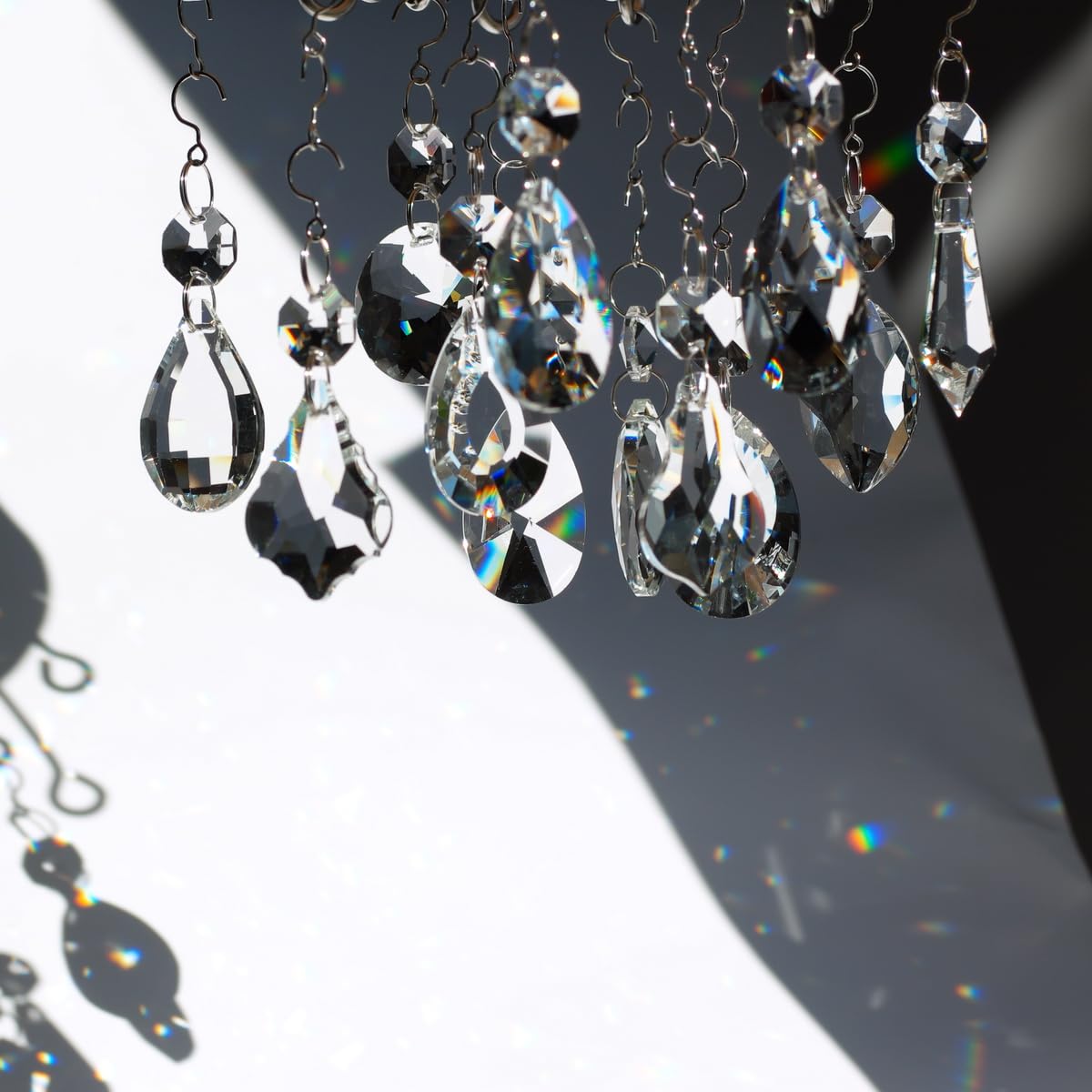 GOLDENHAITAI rainbow crystal prism sparkles across walls in sunlight