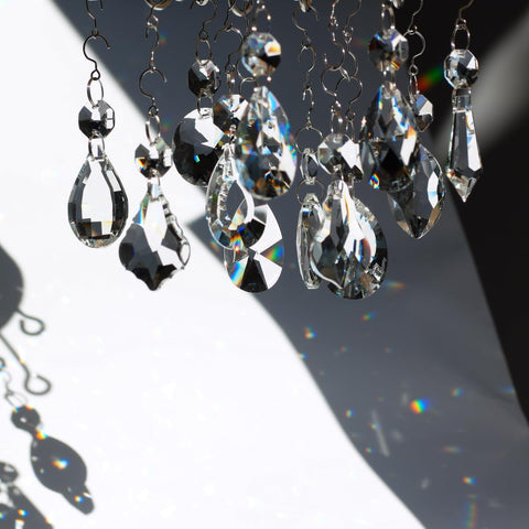 GOLDENHAITAI rainbow crystal prism sparkles across walls in sunlight