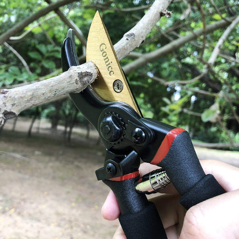 Gonicc pruner in action delivering smooth, controlled cutting on stems.