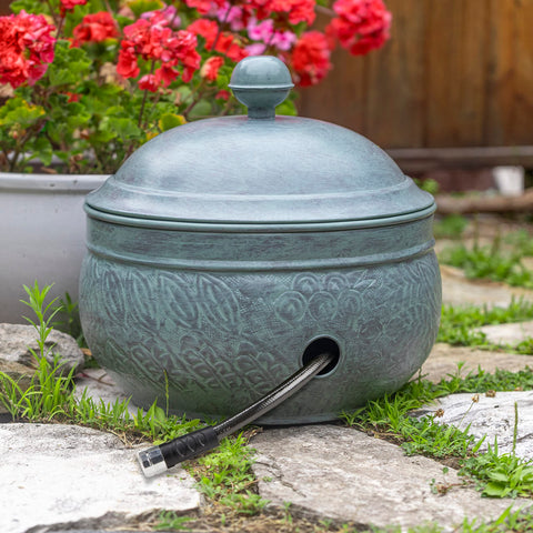 Lightweight steel Key West Hose Pot is easy to move around the yard.