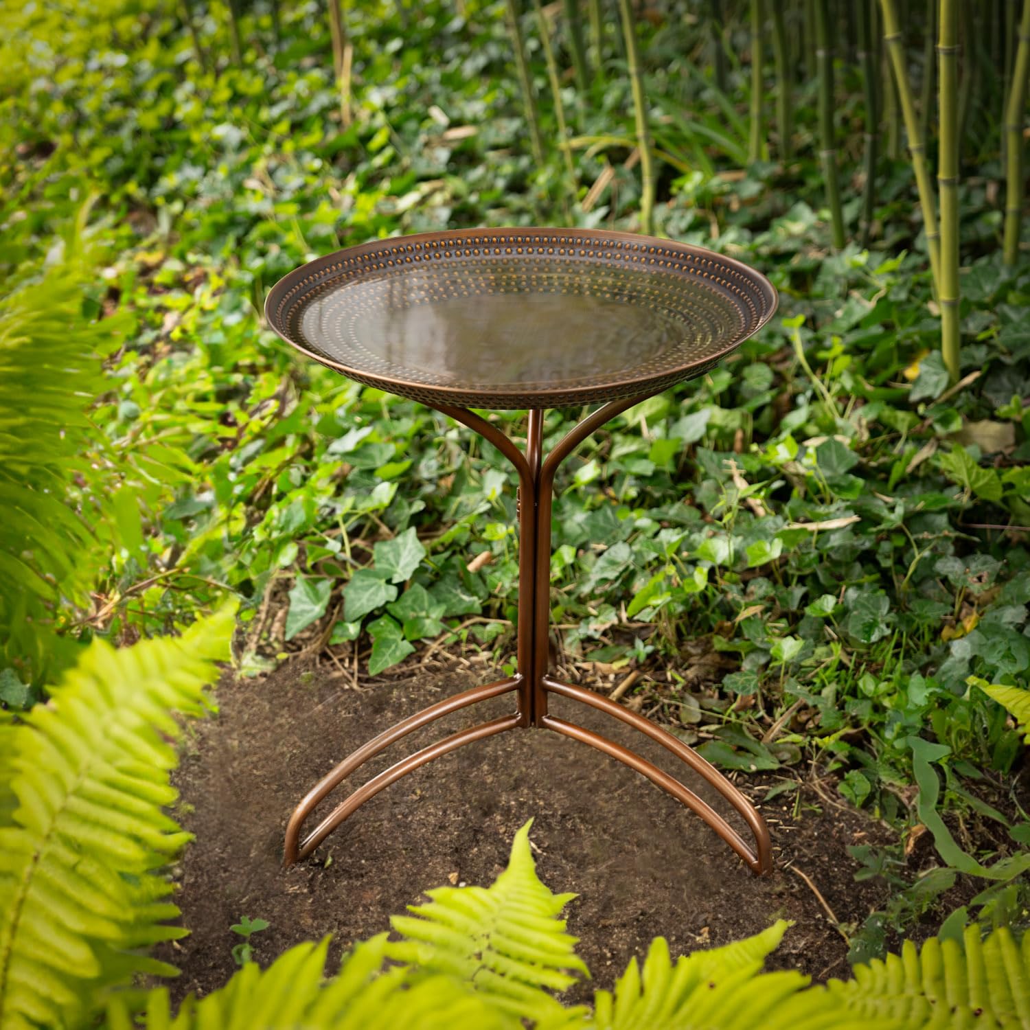Good Directions Tranquility birdbath with durable aluminum base handles year-round use.