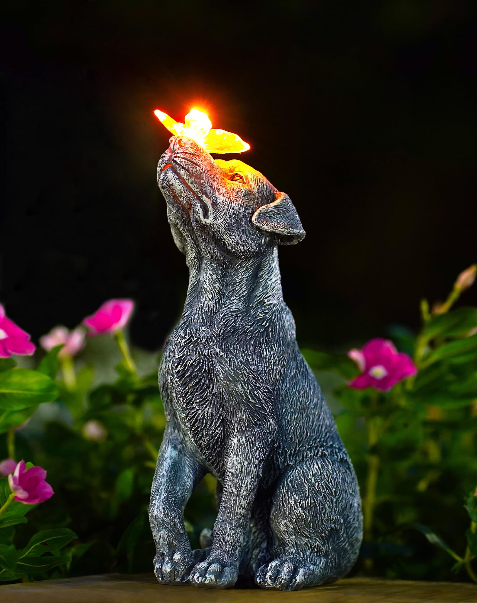 Goodeco dog statue with solar butterfly lights adds charming evening ambiance to gardens.