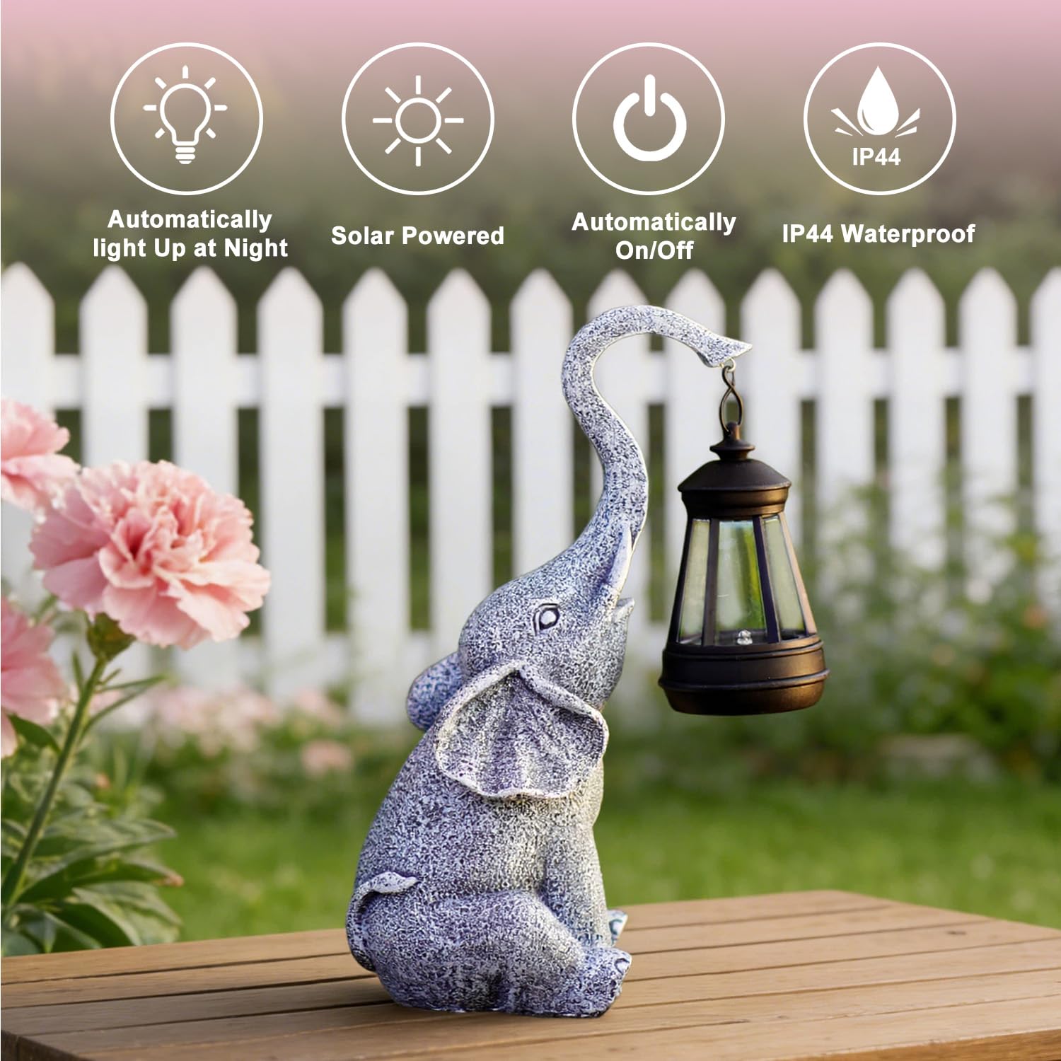 Goodeco Elephant Statue detailed craftsmanship enhances porch and flower beds.