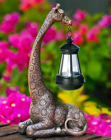 Goodeco 11-inch giraffe statue with garden lantern for outdoor ambiance.