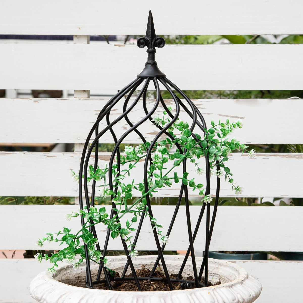 GOOOXIM obelisk trellis being assembled for quick setup.