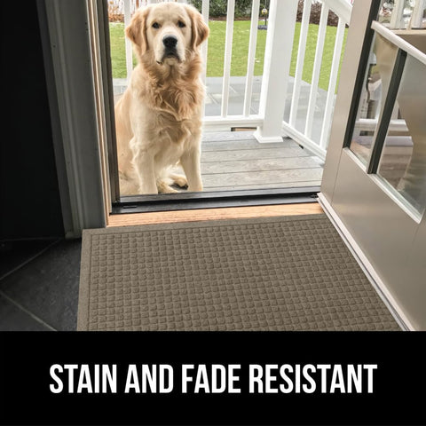 GORILLA GRIP mat demonstrating easy cleaning and maintenance at doorstep.