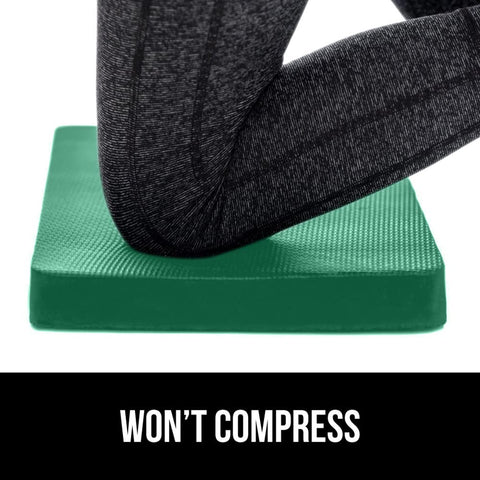 GORILLA GRIP kneeling pad dirt-resistant surface on rugged ground.