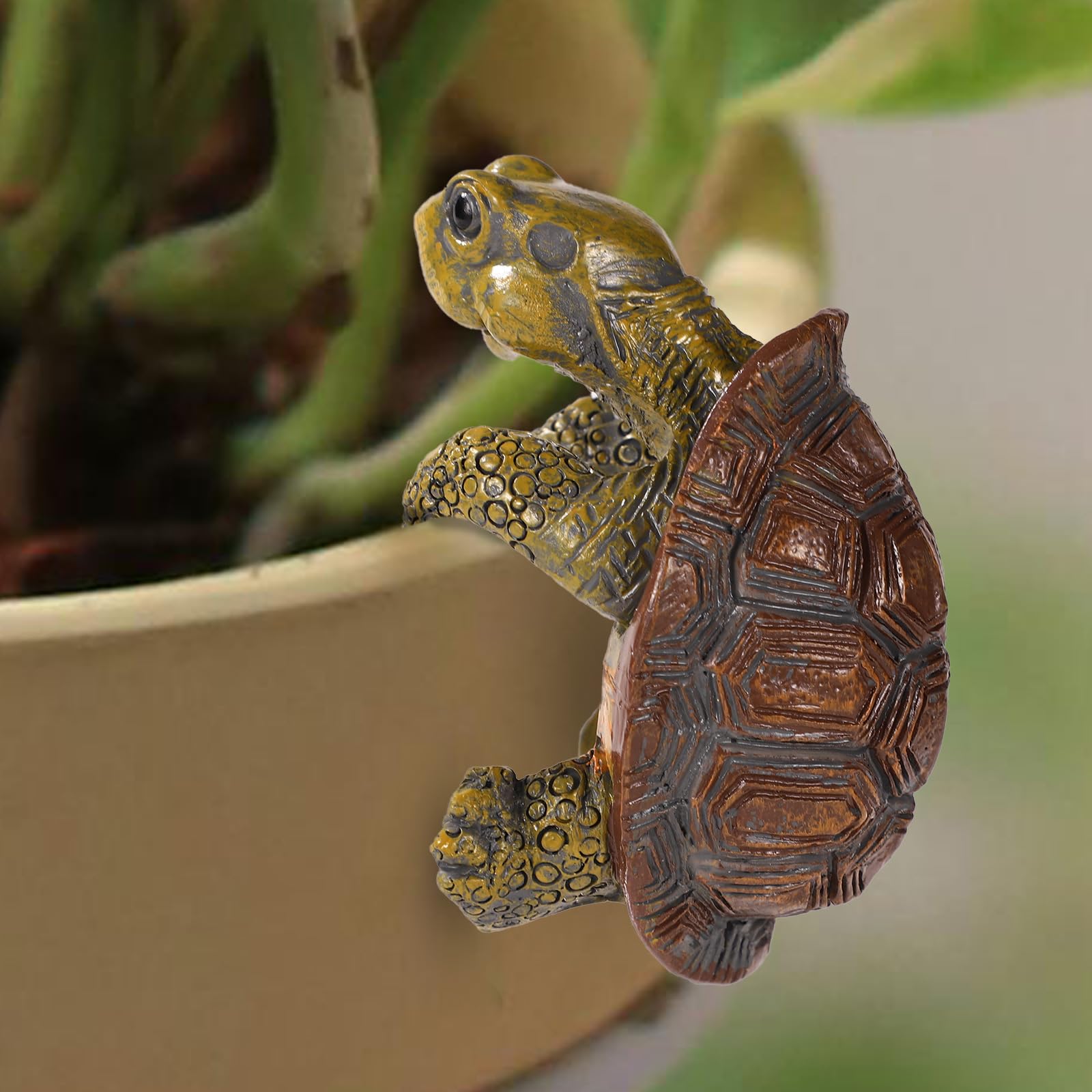 Gosknor tortoise figure plant pot hanger grips pot edge, adding playful outdoor or indoor charm.