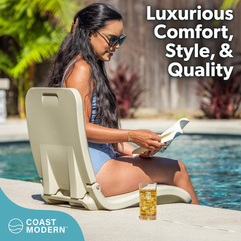 GoSports Coast Modern poolside chair on pool edge providing stable seating.