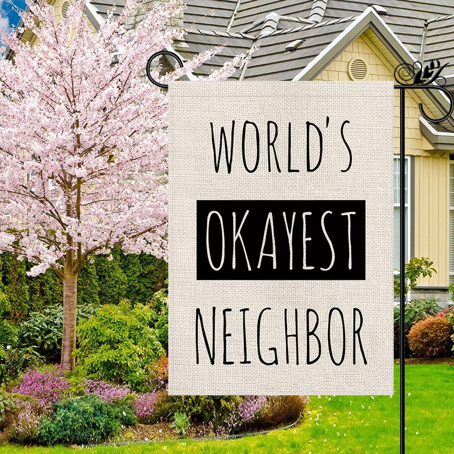GPGHE flag outdoors in yard, boosts curb appeal with playful art.