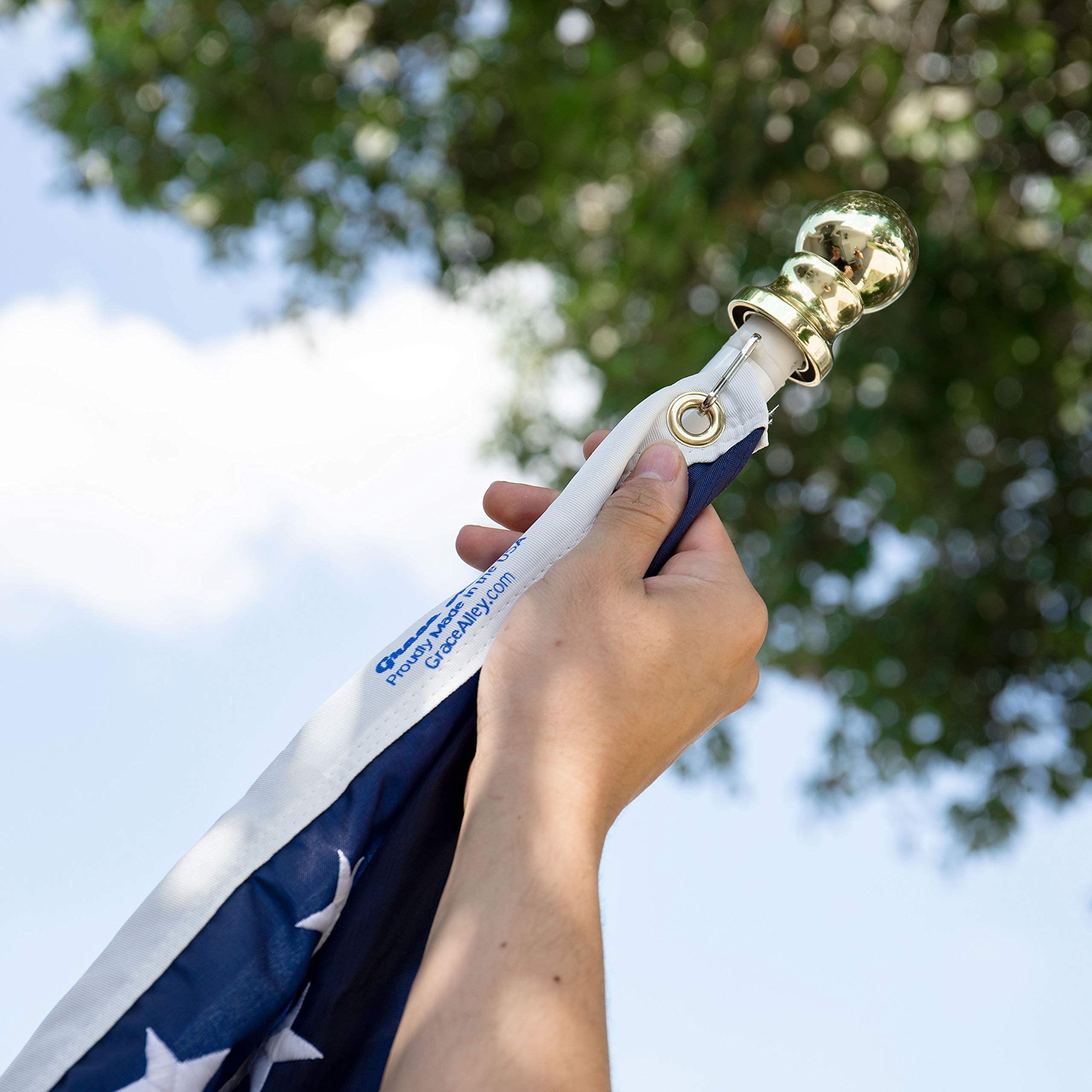 Grace Alley one-inch diameter pole fits standard flag sleeves and grommets.