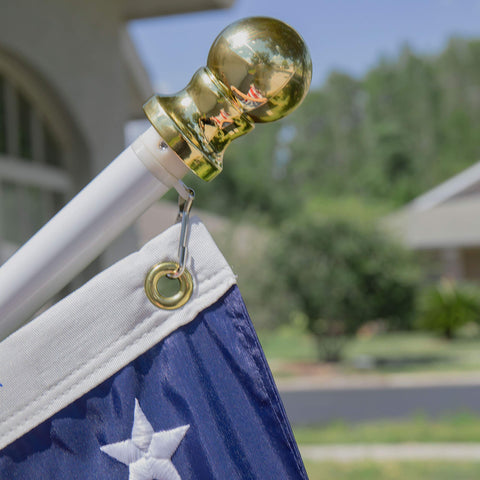 Grace Alley tangle-free design prevents flag furling during gusts on residential facades.