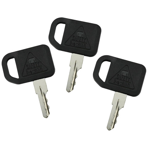Gradora ignition keys on tool bench, ideal spare for field service.