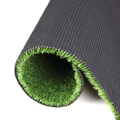 Grass Express artificial grass 10x10 wedding backdrop green under soft lighting.