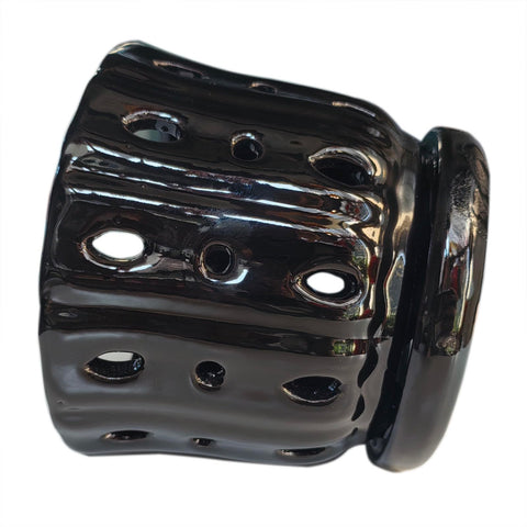 Grdthzey porcelain orchid pot highlighting a classic black color.