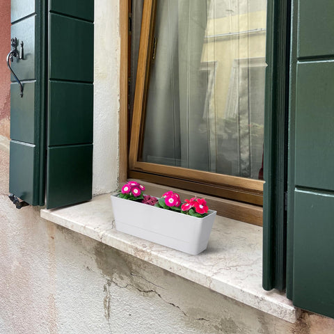 Removable tray in GREANER planter makes cleaning easy