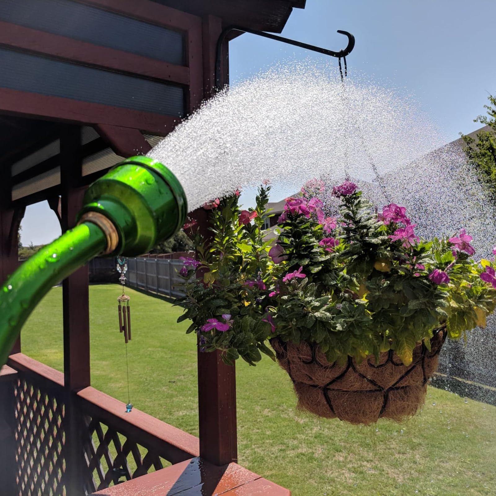GREEN MOUNT wand in use on a bush showing broad coverage.