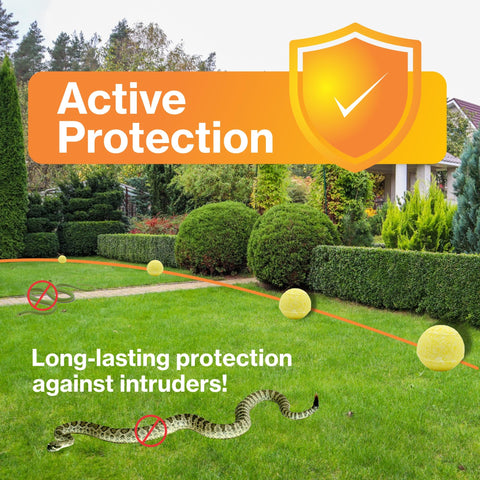 Greenbase snake-repellent-ball near garden bed shields plants from snakes.