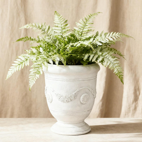 Greens Word white decorative planter complements modern home decor