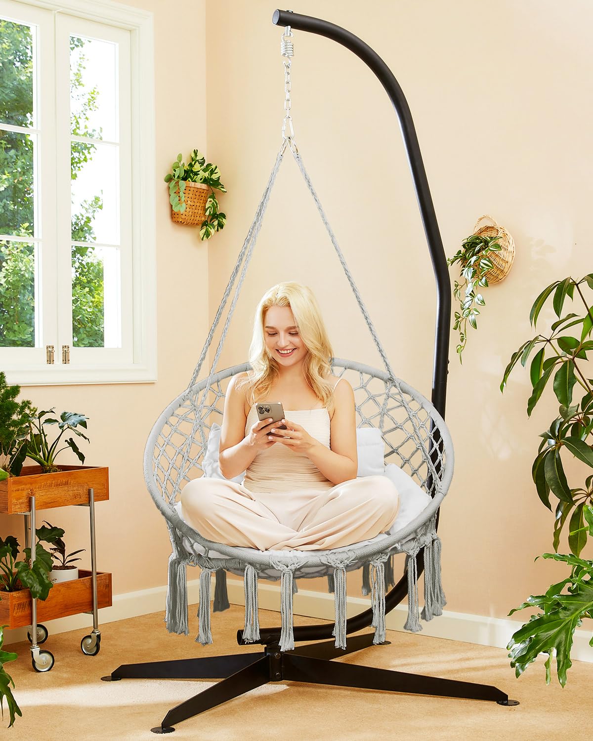 GREENSTELL hammock chair indoor outdoor use supports relaxed reading and lounging.