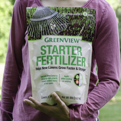 GreenView Starter Fertilizer packaging shown in a yard setting