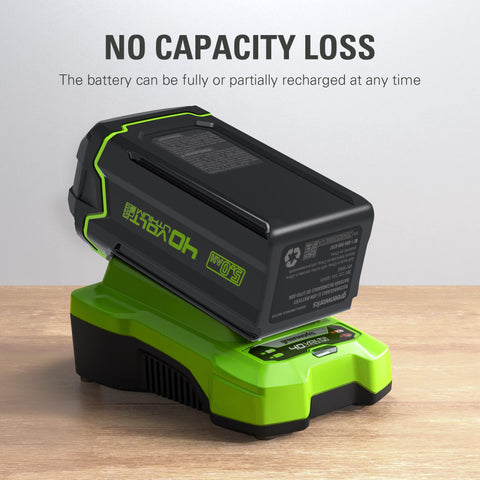 Greenworks 40V 5Ah battery being snapped in and out for hassle-free operation.