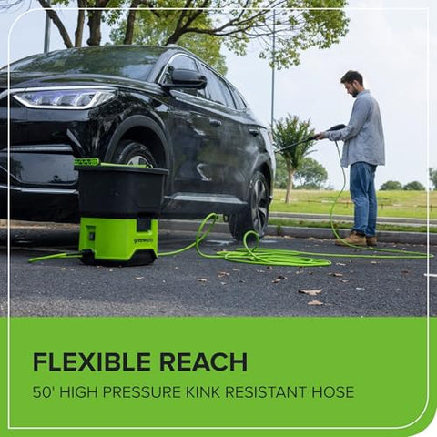 Greenworks 50ft hose extended across a driveway for broad cleaning reach