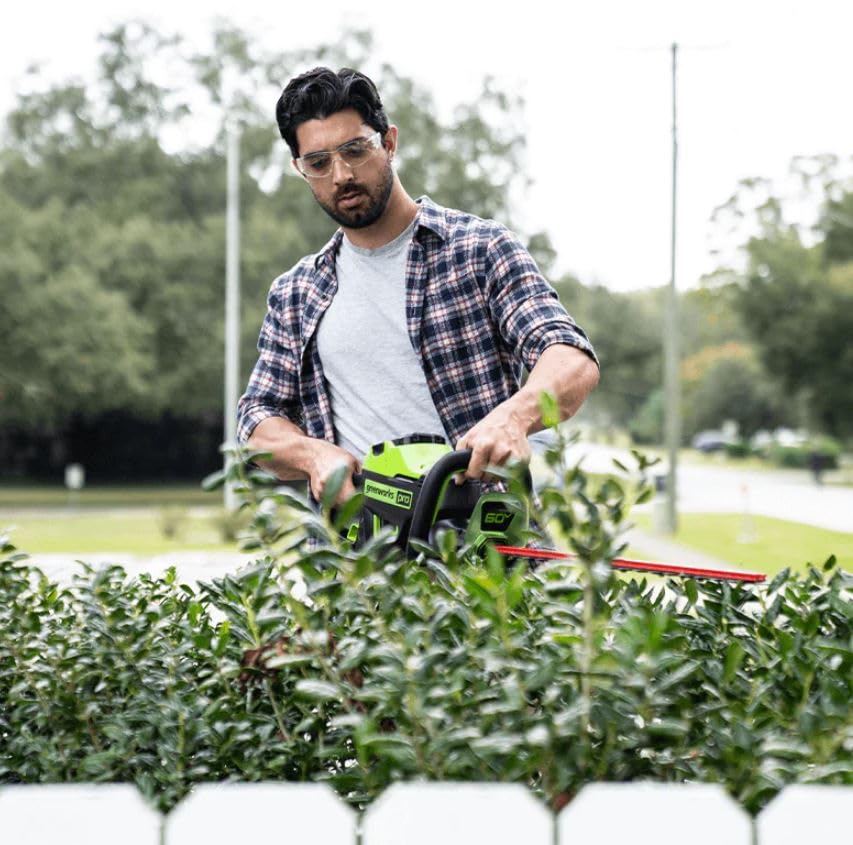 Greenworks 60V hedge trimmer battery and charger included in pack