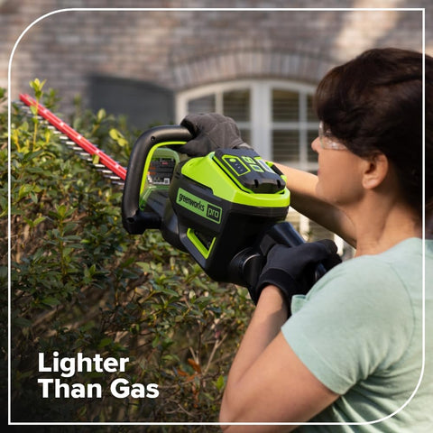 Greenworks PRO 80V hedge trimmer battery and charger setup.
