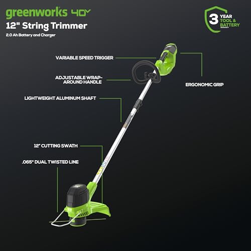 Greenworks 12in commercial trimmer with auto-feed cutting through thick weeds along borders